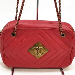 CHANEL Red Quilted Chevron Crossbody Bag with Gold CC Plaque